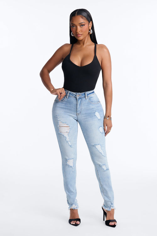 All Caught Up Ripped Raw Hem Skinny Jeans - Light Wash