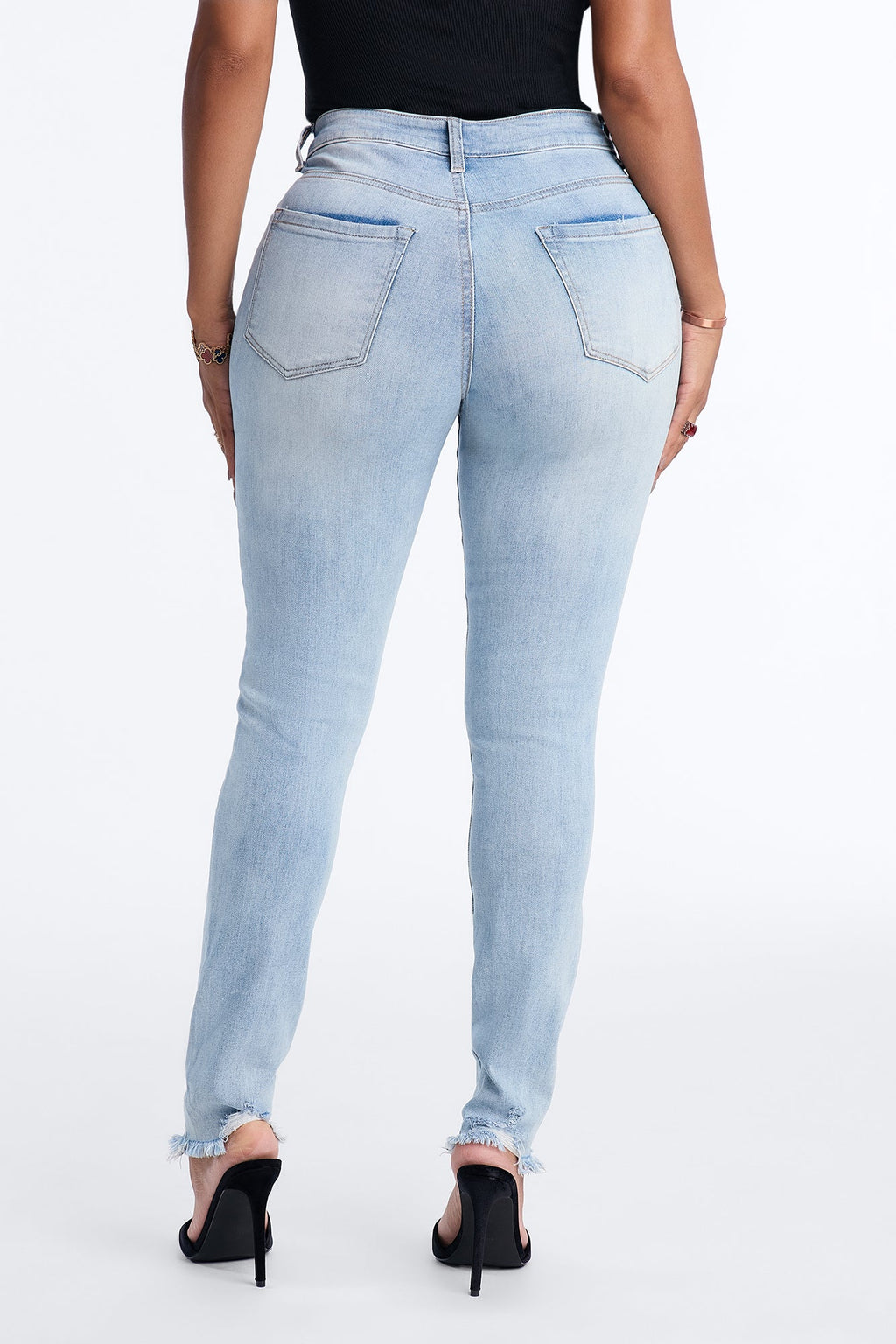 All Caught Up Ripped Raw Hem Skinny Jeans - Light Wash