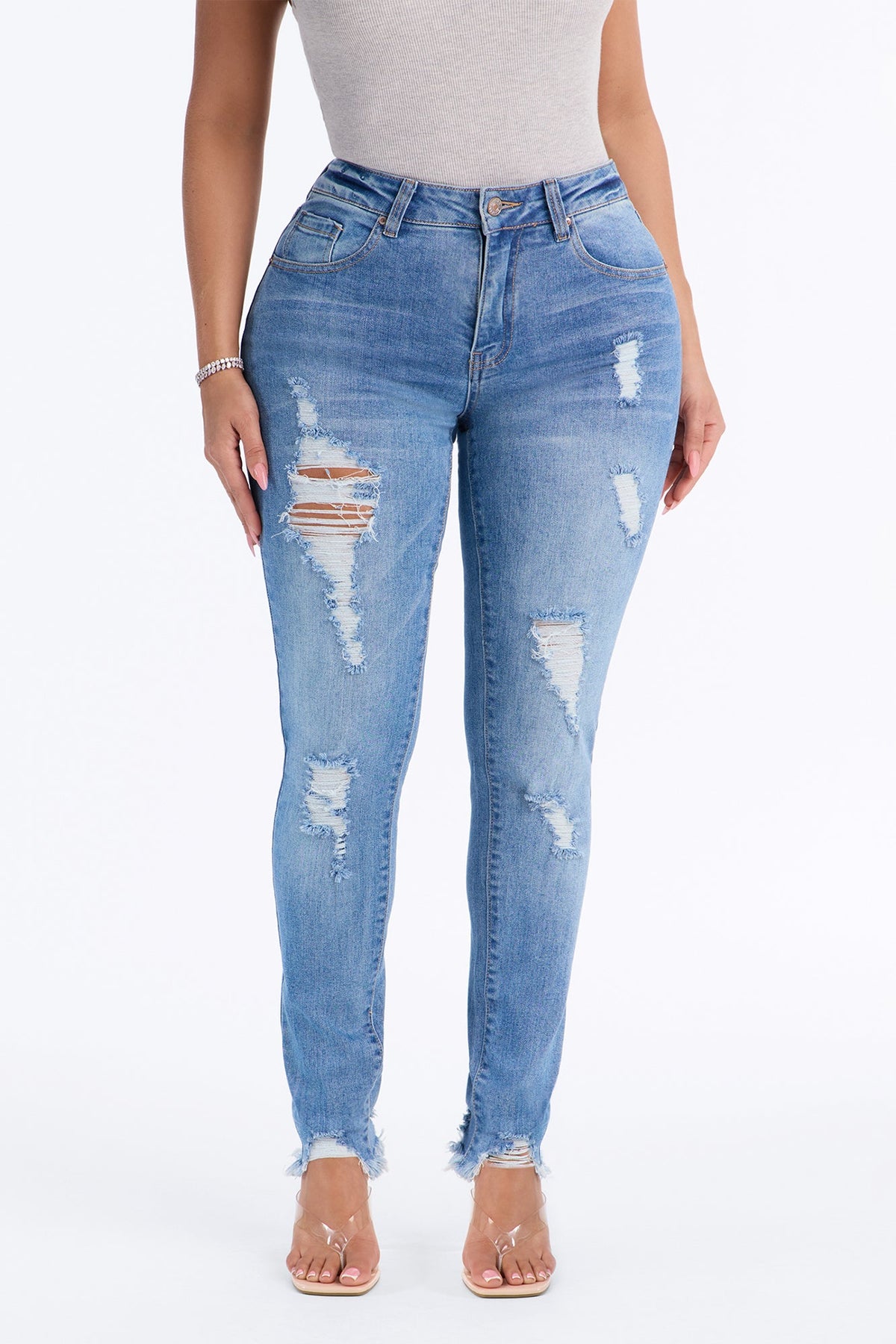 All Caught Up Ripped Raw Hem Skinny Jeans - Medium Wash