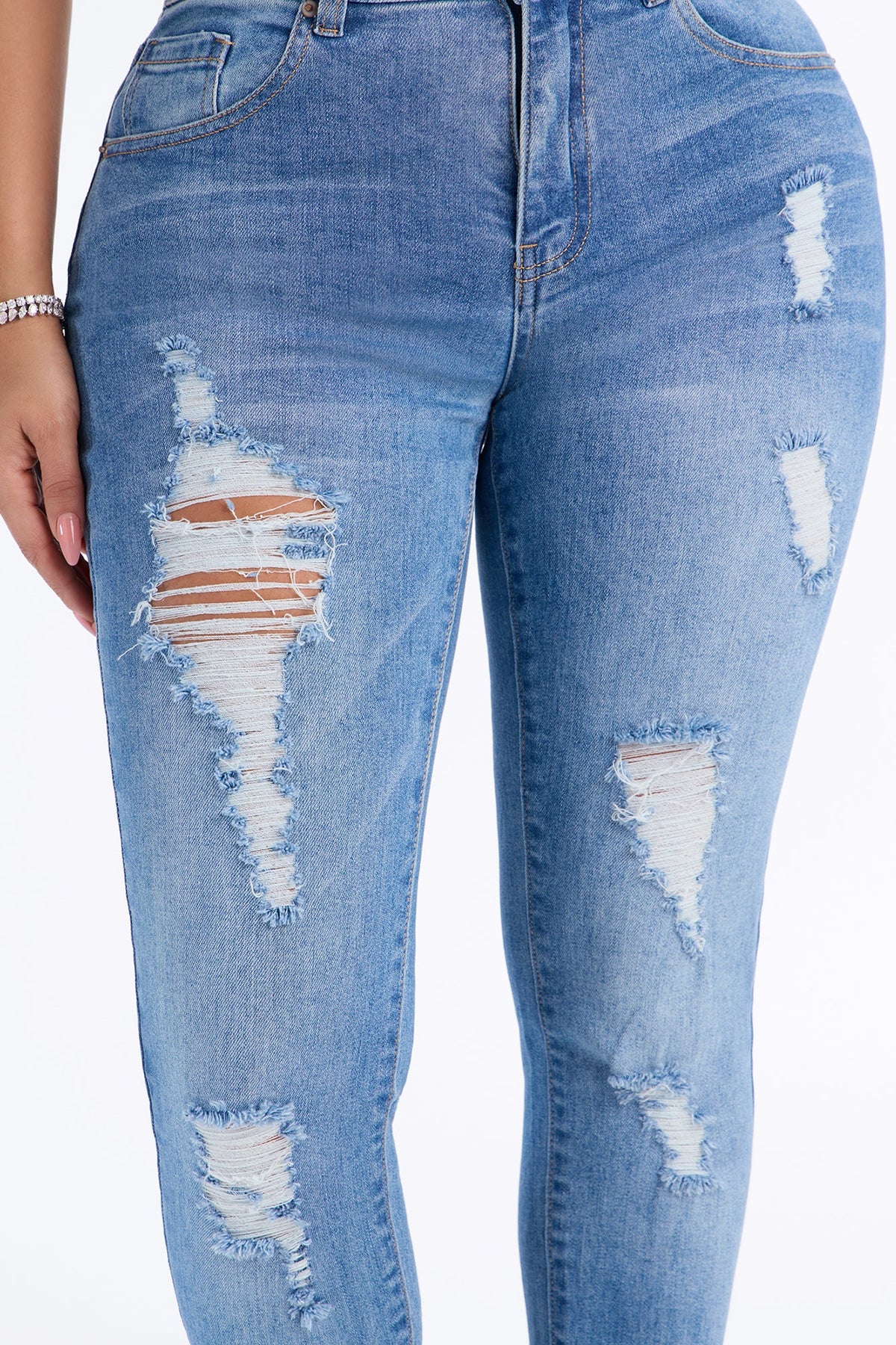All Caught Up Ripped Raw Hem Skinny Jeans - Medium Wash